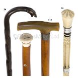 Ø A 19TH CENTURY MALACCA AND MARINE IVORY WALKING STICK COMMEMORATING THE WHALER CAMBRIAN