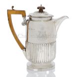 A SILVER SEA-GOING HOT WATER POT FROM THE SERVICE OF ADMIRAL SIR ROBERT TRISTRAM RICKETTS BT