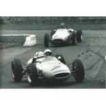 Stirling Moss Motor Racing Signed 10 x 8 inch sport photo. Good Condition. All autographs are