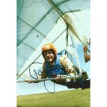 David Jason signed 12 x 8 colour photo on hang glider. Good Condition. All autographs are genuine