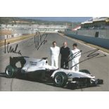 Formula 1 Sauber Motor Racing 2010 team 12 x 8 photo of two drivers in with car in race overalls