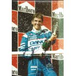 Damon Hill Motor Racing Signed 12 x 8 inch sport photo. Good Condition. All autographs are genuine