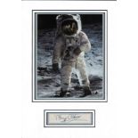 Buzz Aldrin signature piece mounted below colour moon walk photo. Approx overall size 15x11. Good