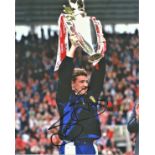 Steve Bruce Man United Signed 12 x 8 inch football photo. Good Condition. All autographs are genuine