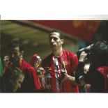 Rio Ferdinand Man United Signed 12 x 8 inch football photo. Good Condition. All autographs are