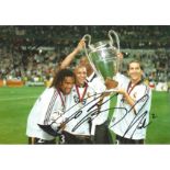 Christian Karembeu, Roberto Carlos and Michel Salgado Real Madrid Signed 12 x 8 inch football photo.