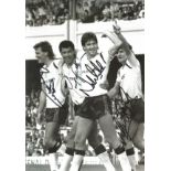 Bryan Robson, Paul McGrath, Norman Whiteside and Mark Hughes signed 12x8 black and white photo. Good