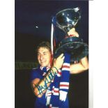 Terry Butcher Rangers Signed 12 x 8 inch football photo. Good Condition. All autographs are