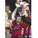 Steven Pressley Hearts Signed 12 x 8 inch football photo. Good Condition. All autographs are genuine