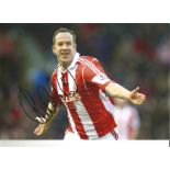 Charlie Adam Stoke signed 12 x 8 inch football photo. Good Condition. All autographs are genuine