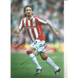 Tuncay Stoke Signed 10 x 8 inch football photo. Good Condition. All autographs are genuine hand