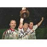 Mike Phelan, Mark Hughes and Steve Bruce Man United Signed 12 x 8 inch football photo. Good