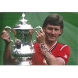 Bryan Robson Man United Signed 12 x 8 inch football colour photo. Good Condition. All autographs are