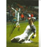 Chico Flores Swansea Signed 10 x 8 inch football photo. Good Condition. All autographs are genuine
