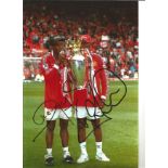 Dwight Yorke and Andy Cole Man United Signed 12 x 8 inch football colour photo. Good Condition.