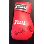 Lonsdale boxing glove signed by Nicola Adams. Good Condition. All autographs are genuine hand signed