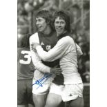 Football Autographed 12 x 8 photo, a superb image depicting ARNOLD MUHREN celebrating with his