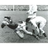 JPR Williams signed 10x8 b/w photo in action playing for Wales against England. Good Condition.