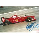 Eddie Irvine signed 12x8 colour photo. former racing driver from Northern Ireland. He competed in