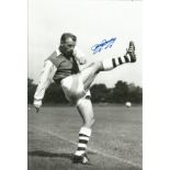 Football Autographed 12 x 8 photo, a superb image depicting TOMMY DOCHERTY, Arsenal's right-half,