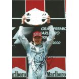 Mika Hakkinen signed 12x8 colour photo. nicknamed "The Flying Finn", is a Finnish former racing