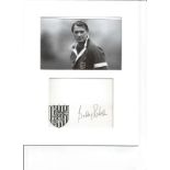 Bobby Robson signature piece mounted below black and white photo of the England manager. Approx