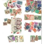 Worldwide stamp collection 57 envelopes of stamps from countries around the world including Great