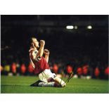 Dennis Bergkamp Arsenal Signed 16 x 12 inch football photo. Supplied from stock of www.