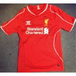 Liverpool shirt signed by Carragher, Gerrard, Smicer and Garcia. Supplied from stock of www.