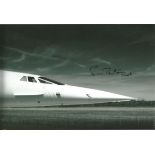 Norman Britton Concorde Pilot signed 12x8 b/w photo. Good Condition. All autographs are genuine hand