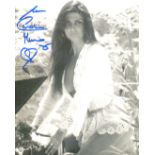 Bond girl. 8x10 inch photo signed by The Spy Who Loved Me Bond girl Caroline Munro in a sexy pose.