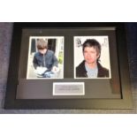 Noel Gallagher signed colour photo. Mounted and framed with another colour photo and silver