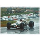 Dan Gurney signed 12 x 8 1968 Dutch GP action Motor Racing photo. Good Condition. All autographs are
