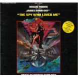 Multi signed The Spy who loved me 33rpm record sleeve. Signed on front cover by Caroline Munro and