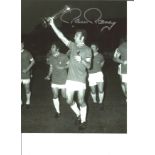 Paul Reaney 10x8 Signed B/W Football Photo Pictured Celebrating With His Leeds Team Mates After