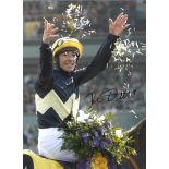Frankie Dettori Signed 16 X 12 inch horse racing photo. Supplied from stock of www.sportsignings.com