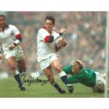 Rory Underwood signed 8x10 colour rugby photo pictured in action for England. Supplied from stock of
