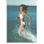 Elle Macpherson signed 8x6 colour photo. Good Condition. All autographs are genuine hand signed