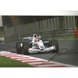 Robert Kubica signed 12x80 colour photo racing BMW in 2007. Good Condition. All autographs are