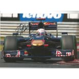 Jaime Alguersuari signed 12x8 colour photo racing Toro Rossa in 2009. Good Condition. All autographs