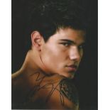 Taylor Lautner signed 10 x 8 colour photo from The Twilight Saga. Good Condition. All autographs are