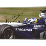 Nick Heidfeld signed 12x8 colour photo driving a BMW at Nurburgring in 2005. Good Condition. All