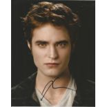 Robert Pattinson signed 10 x 8 colour photo from The Twilight Saga. Good Condition. All autographs