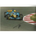 Fernando Alonso signed 11x8 colour photo of him racing Renault in Nürburgring in 2005. Good