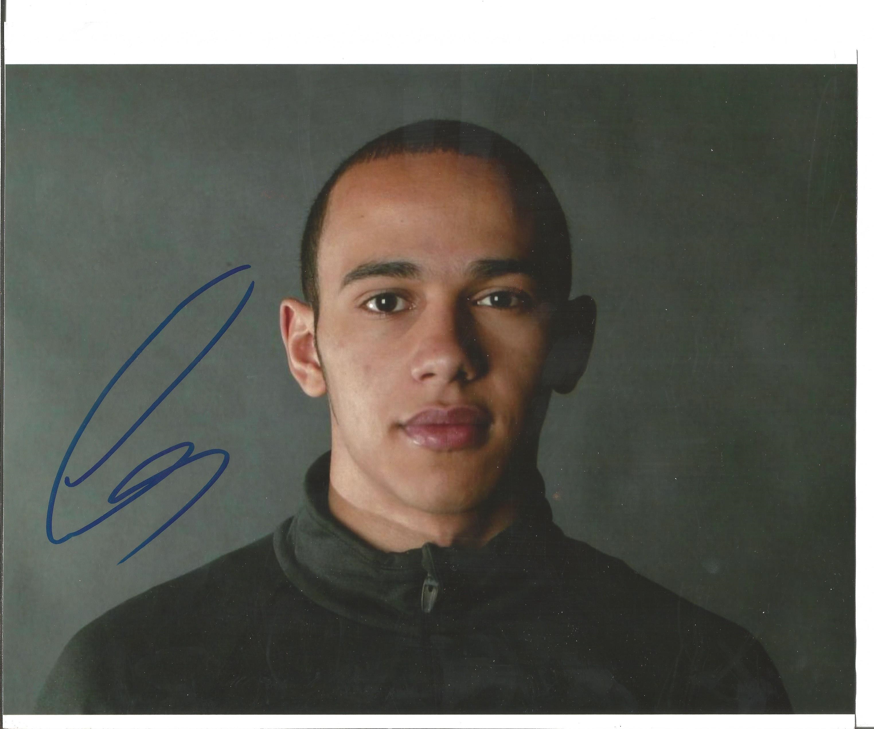 Formula One Lewis Hamilton signed nice young 10 x 8 inch colour head and shoulders portrait photo.