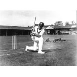 Cricket Sir Garfield Sobers signed 16x12 inch black and white photo pictured in action for the