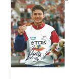 Jonathan Edwards Triple Jump Legend Signed 8x10 Press Photo. Good Condition. All autographs are