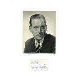 Melvyn Douglas signature piece mounted below black and white photo. Approx overall size 16x12.