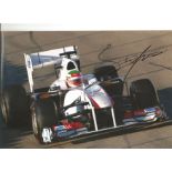 Formula 1 Sergio Perez Grand Prix racing driver signed Sauber car in action photo. Comes with COA