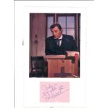 Robert Mitcham signature piece mounted below colour photo. Dedicated. He has signed it Bob